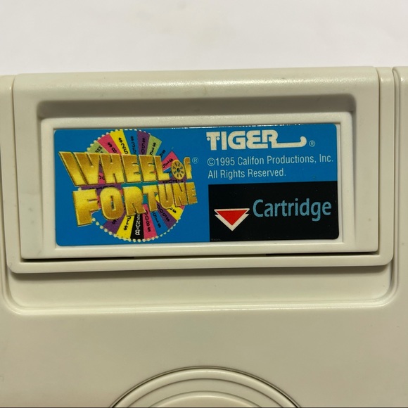 Tiger Wheel of Fortune Electronic Handheld game - Picture 2 of 10